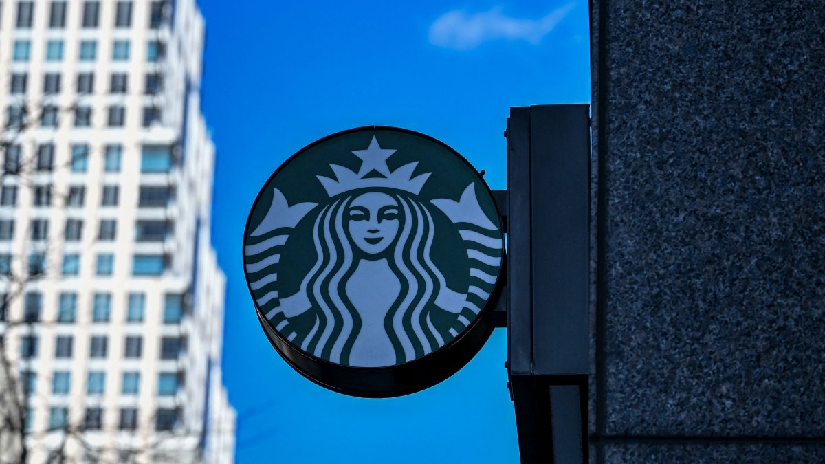 Signs outside a Starbucks in New York City, U.S., Jan. 14, 2025. (AFP Photo)