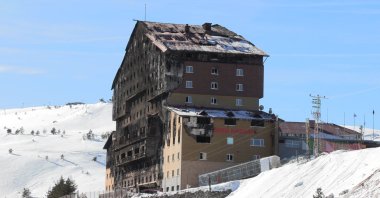 The burned remains of the Grand Kartal Hotel at Kartalkaya Ski Resort following the devastating fire, Bolu, Türkiye, Jan. 29, 2025. (DHA Photo) 