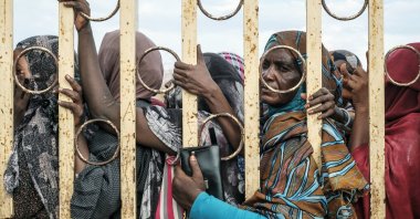 Residents wait in line during a cash distribution by the World Food Programme in a camp for internally displaced people, in Port Sudan, Sudan, Oct. 30, 2024. (Getty Images)