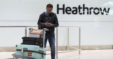 A passenger at the International Arrivals area of Terminal Two at Heathrow Airport near London, U.K., Jan. 22, 2025. (EPA Photo)
