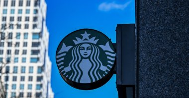 Signs outside a Starbucks in New York City, U.S., Jan. 14, 2025. (AFP Photo)