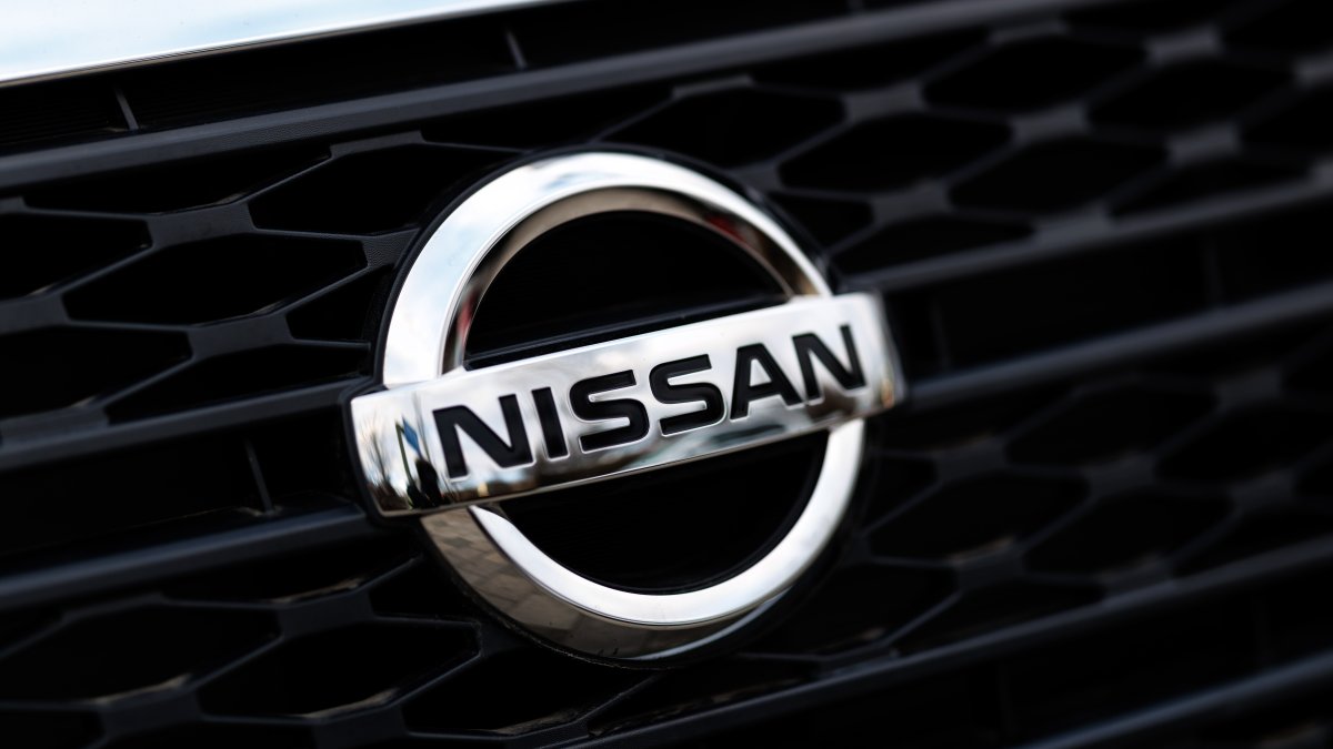 The Nissan brand logo can be seen on a vehicle of the brand at a branch of the company in Munich, Germany, Jan. 10, 2025. (Reuters Photo)