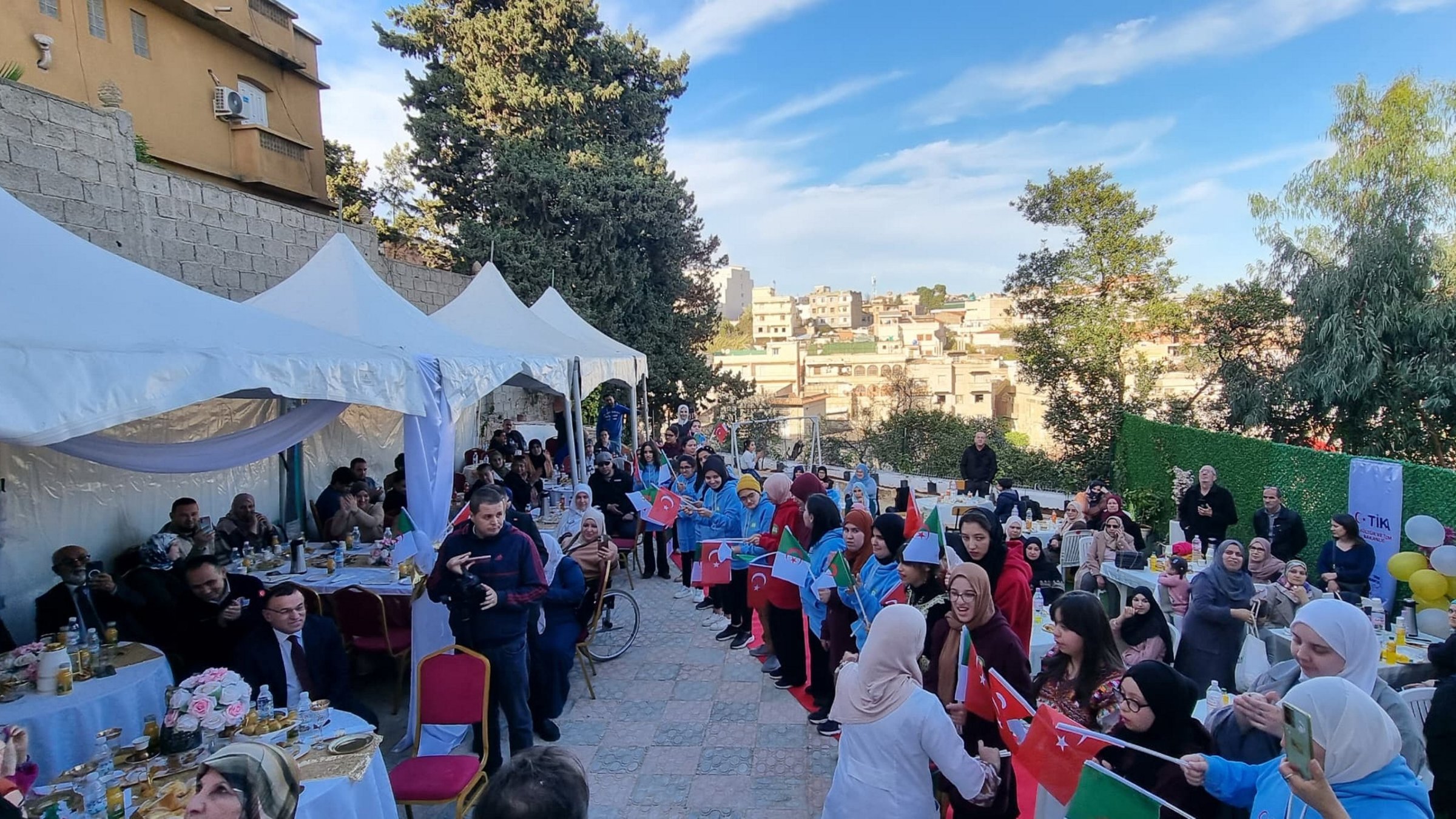 People attend the opening ceremony of the sewing workshop sponsored by the Turkish Cooperation and Coordination Agency (TIKA) at the Tahaddi and Azimet Association, Algiers, Algeria, Jan. 29, 2025. (AA Photo)