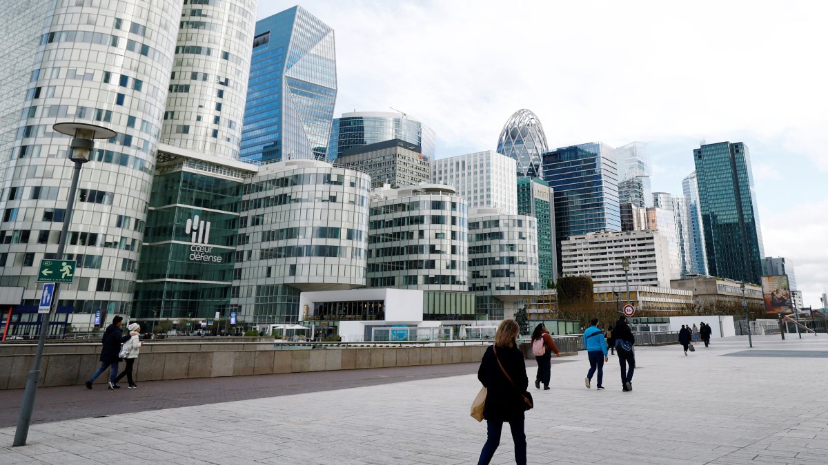 People walk on the esplanade of La Defense in the financial and business district of La Defense, near Paris, France, Jan. 27, 2025. (Reuters Photo)