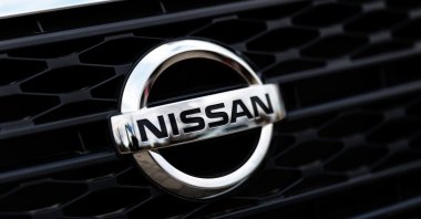 The Nissan brand logo can be seen on a vehicle of the brand at a branch of the company in Munich, Germany, Jan. 10, 2025. (Reuters Photo)