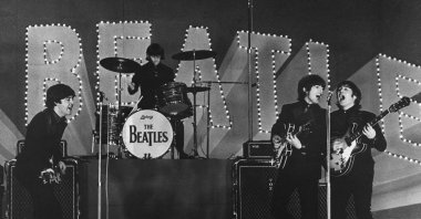 This photo shows British band The Beatles, (L to R) Paul McCartney, Ringo Starr, George Harrison and John Lennon, performing during their concert at the Budokan in Tokyo, Japan, June 30, 1966. (AFP Photo)
