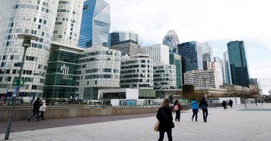 People walk on the esplanade of La Defense in the financial and business district of La Defense, near Paris, France, Jan. 27, 2025. (Reuters Photo)