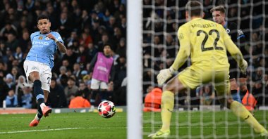 Manchester City's Brazilian midfielder Savinho (L) scores in a Champions League match against Club Brugge, in Manchester, U.K., Jan. 29, 2025. (AFP Photo)