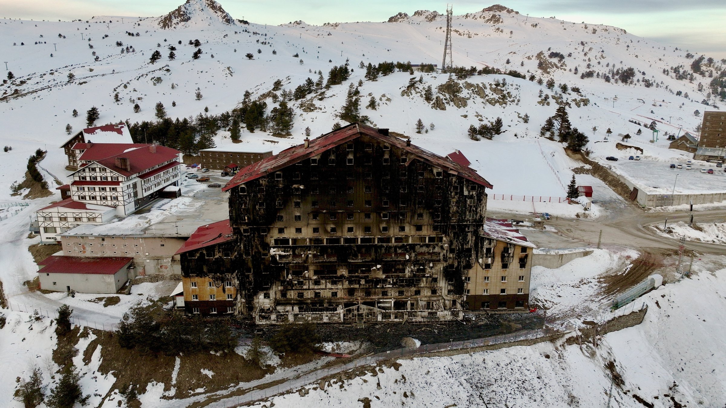 An aerial view of the burnt Grand Kartal Hotel after the deadly fire, Kartalkaya, Bolu, Türkiye, Jan. 31, 2025. (AA Photo)