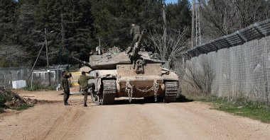 Israeli soldiers stand next to their tanks next to the border with Lebanon in Upper Galilee, northern Israel, Jan. 28, 2025. (EPA Photo)