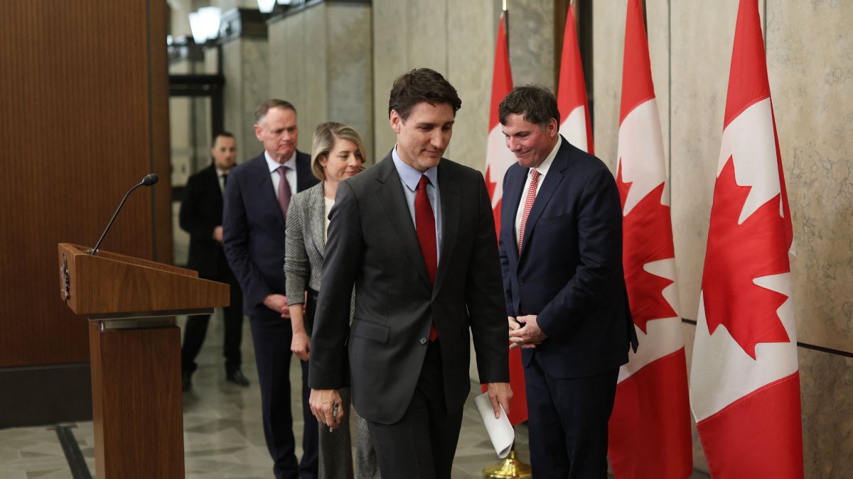 Canada&#039;s Prime Minister Justin Trudeau leaves after speaking, flanked by (from L) Minister of Public Safety David McGuinty, Minister of Foreign Affairs Melanie Joly and Minister of Finance and Intergovernmental Affairs Dominic LeBlanc, during a news conference at Parliament Hill, Ottawa, Canada, Feb. 1, 2025. (AFP Photo)