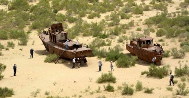 Two wrecks of small boats are seen at the dried-up Aral Sea, which has shrunk, situated between Uzbekistan and Kazakhstan, Feb. 1, 2025. (AA Photo)