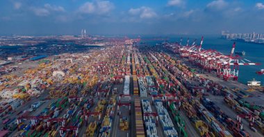 Ships are loaded at the container terminal of the port in Qingdao, eastern Shandong province, China, Jan. 25, 2025. (AFP Photo)