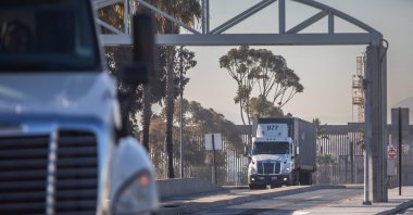 Trucks drive into United States at the Otay Mesa Port of Entry, on the U.S.-Mexico border in San Diego, California, U.S., Feb. 1, 2025. (AFP Photo)