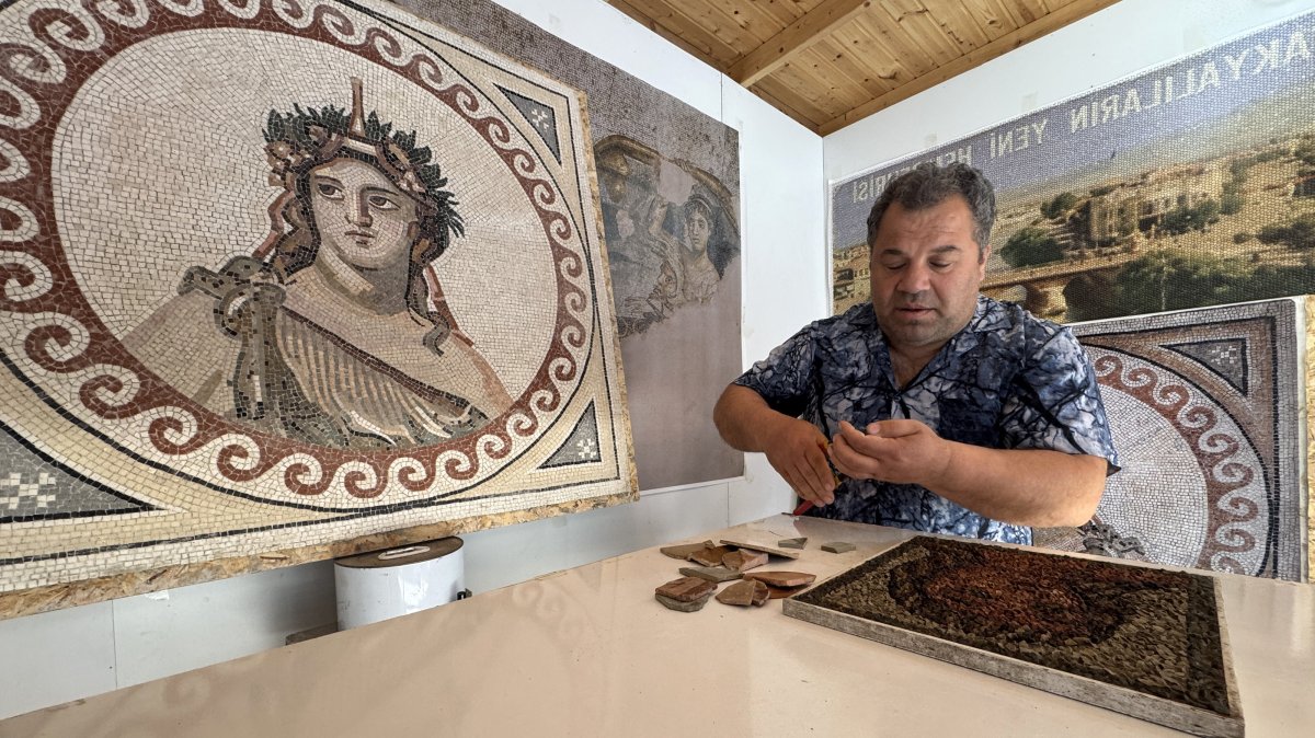 A local artist works on a decorative mosaic in his shop, Hatay, Türkiye, Feb. 30, 2025. (AA Photo)