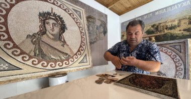A local artist works on a decorative mosaic in his shop, Hatay, Türkiye, Feb. 30, 2025. (AA Photo)