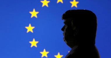 A 3D-printed miniature model of U.S. President Donald Trump and the European Union&#039;s flag are seen in this illustration taken Jan. 27, 2025. (Reuters Photo)