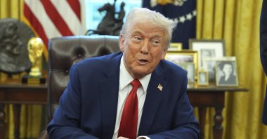 U.S. President Donald Trump speaks after signing an executive order in the Oval Office of the White House, Washington, D.C., Feb. 3, 2025. (AP Photo)