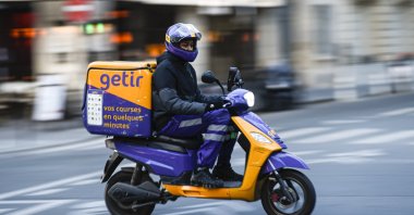 A courier of Turkish fast grocery-delivery company Getir is seen on his motorcycle in Paris, France, April 26, 2023. (Reuters Photo)