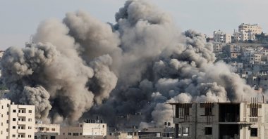 Smoke rises during an Israeli army operation in Jenin, in the Israeli-occupied West Bank, February 2, 2025. REUTERS/Raneen Sawafta    
