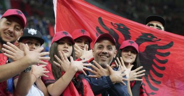  Albanian supporters gesture as they wait for the start of the Group B match between Italy and Albania at the Euro 2024 soccer tournament in Dortmund, Germany, Saturday, June 15, 2024. (AP File Photo)