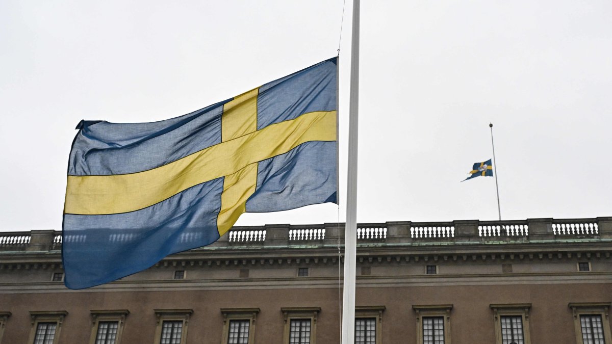 The Swedish flag flies at half-mast on the Royal Stockholm Palace, Stockholm, Sweden, Feb. 5, 2025. (AFP Photo)
