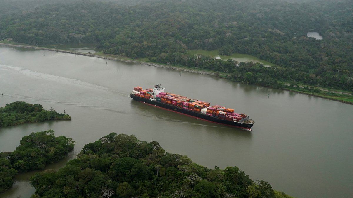An aerial view shows a cargo ship transiting through the Panama Canal, in Panama City, Panama, Feb. 1, 2025. (Reuters Photo)