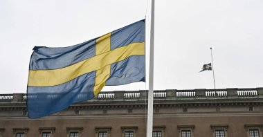 The Swedish flag flies at half-mast on the Royal Stockholm Palace, Stockholm, Sweden, Feb. 5, 2025. (AFP Photo)