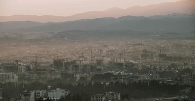This photograph shows the Turkish Public Housing Agency (TOKI) construction areas (up) and the old city (down) in Antakya of Hatay province, southeastern Türkiye, Jan. 29, 2025.