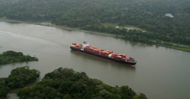 An aerial view shows a cargo ship transiting through the Panama Canal, in Panama City, Panama, Feb. 1, 2025. (Reuters Photo)