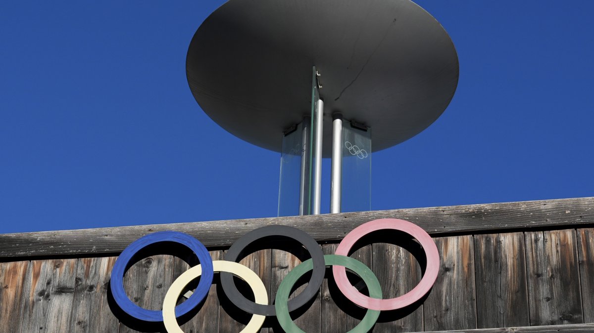 The Olympic rings adorn the Stadio Olimpico del Ghiaccio, which will be called Cortina Curling Olympic Stadium, the venue for the curling discipline at the Milan Cortina 2026 Winter Olympics, Cortina d&#039;Ampezzo, Italy, Jan. 16, 2025. (AP Photo)