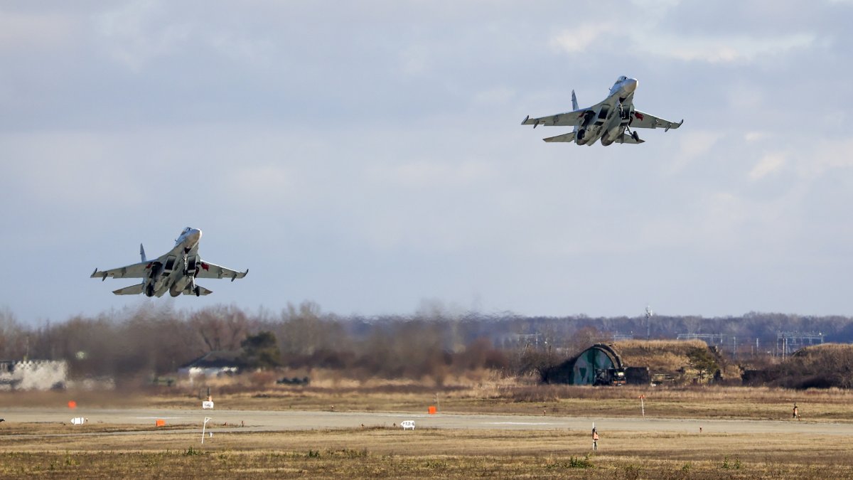Two Russian Su-30 fighter jets take off from an airfield in Krasnodar Region, Russia, Jan. 19, 2022. (AP Photo)
