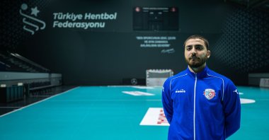Turkish handball player Barış Buğday poses for a photo after an interview with Anadolu Agency (AA), Hatay, Türkiye, Feb. 5, 2025. (AA Photo)