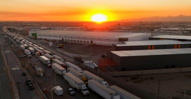 A drone view shows trucks waiting in line near the Zaragoza-Ysleta border crossing bridge to cross into the U.S., Ciudad Juarez, Mexico, Jan. 31, 2025. (Reuters Photo)