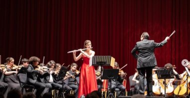 Turkish flutist Duru Bulam performs with the orchestra. (Duru Bulam on Instagram)