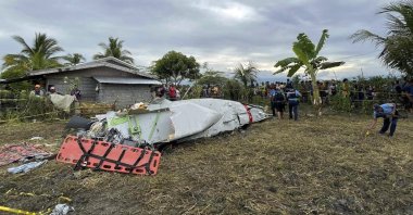 Wreckage of a U.S. military-contracted plane after it crashed in a rice field in Maguindanao del Sur province, southern Philippines, Feb. 6, 2025. (AP Photo)