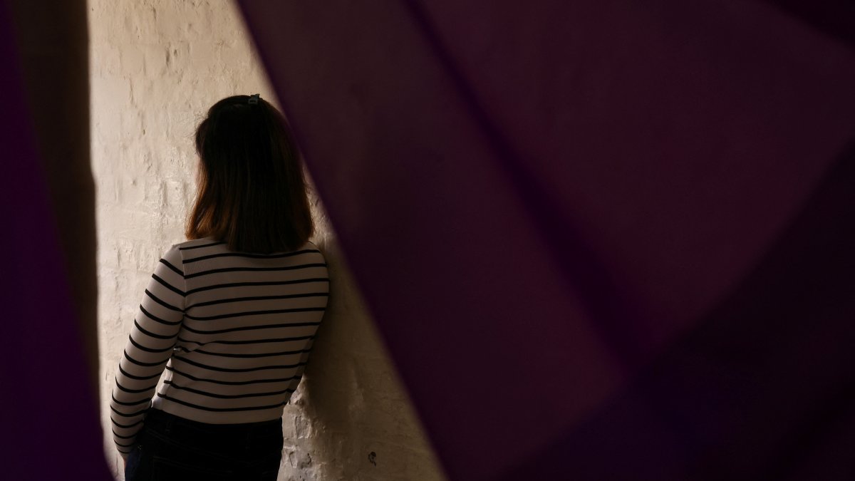 A suspected victim of modern slavery, who was initially denied state support after Britain introduced a tougher immigration policy, poses for a portrait following an interview with Reuters, London, U.K., Sept. 19, 2024. (Reuters Photo)
