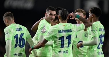 FC Barcelona's Ferran Torres celebrates (2nd L) with his teammates after scoring during a Copa del Rey quarterfinals match against Valencia at the Estadio de Mestalla, Valencia, Spain, Feb. 6, 2025. (Reuters Photo)