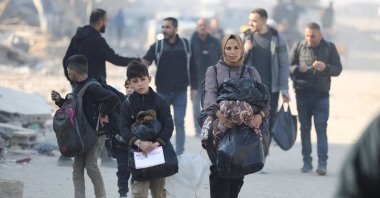Palestinian people displaced to the south at Israel&#039;s order during its attacks make their way as they return to their homes in northern Gaza, Palestine, Jan. 29, 2025. (Reuters Photo)
