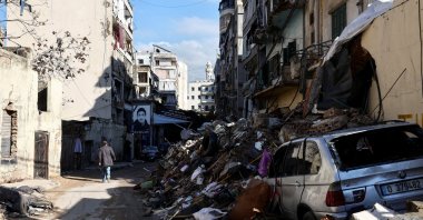 A man walks past a damaged site in the Chiyah district, after the cease-fire between Israel and Hezbollah, Beirut, Lebanon, Dec. 5, 2024. (Reuters Photo)