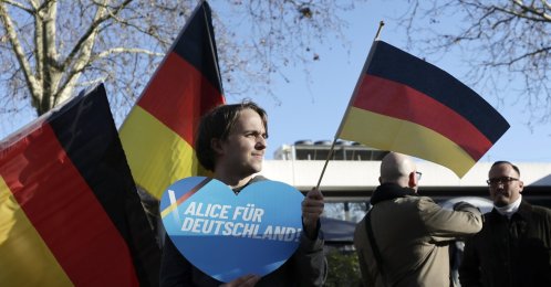A supporter of the Alternative for Germany (AfD) party holds a heart-shaped sign reading &quot;Alice for Germany&quot; during the election campaign of the AfD, Neu-Isenburg, Germany, Feb. 1, 2025. (EPA Photo)