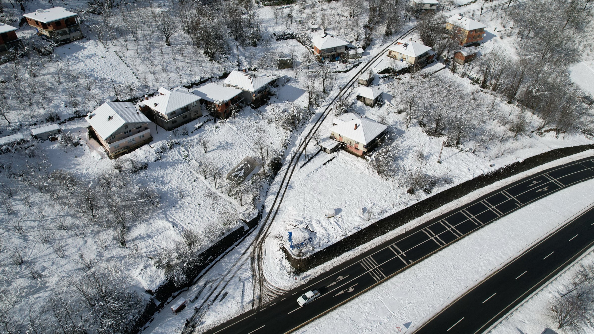 An aerial view shows a snow-covered village in Zonguldak, Türkiye, Feb. 6, 2025. (IHA Photo) 