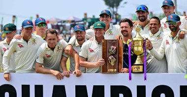 Australia&#039;s players pose with the trophies after their win in the second Test and series against Sri Lanka, Galle, Sri Lanka, Feb. 9, 2025. (AFP Photo)