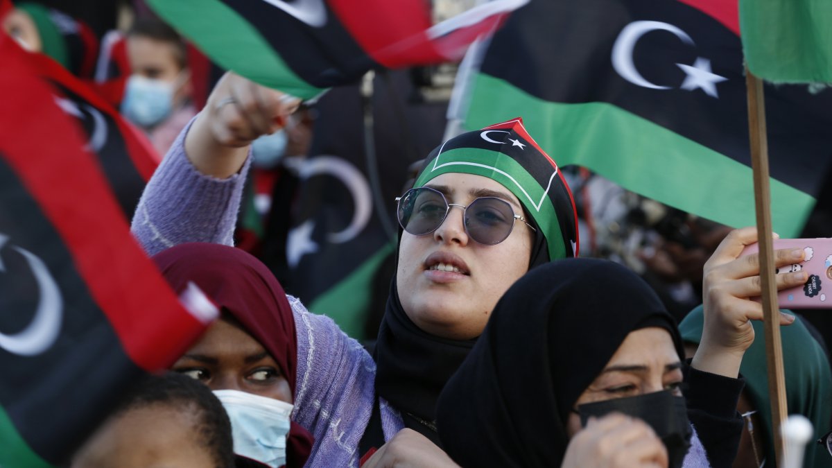 Libyans celebrate the February Revolution Day in Martyrs&#039; Square, Tripoli, Libya, Feb. 18, 2022. (AP Photo)