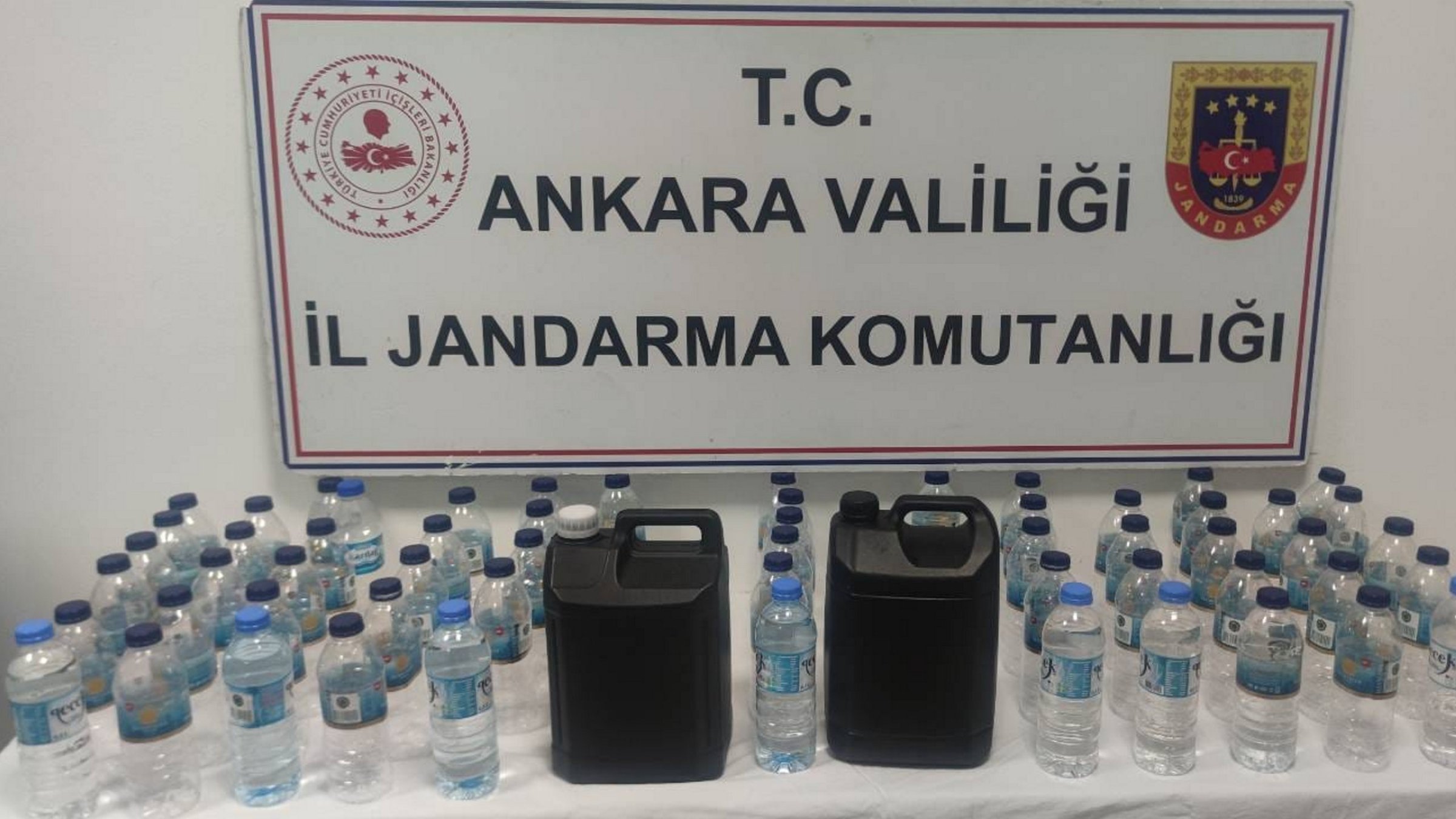 A suspect was arrested for fake alcohol production, with 4 liters of fake alcohol seized, Ankara, Türkiye, Jan. 31, 2025. (AA Photo)