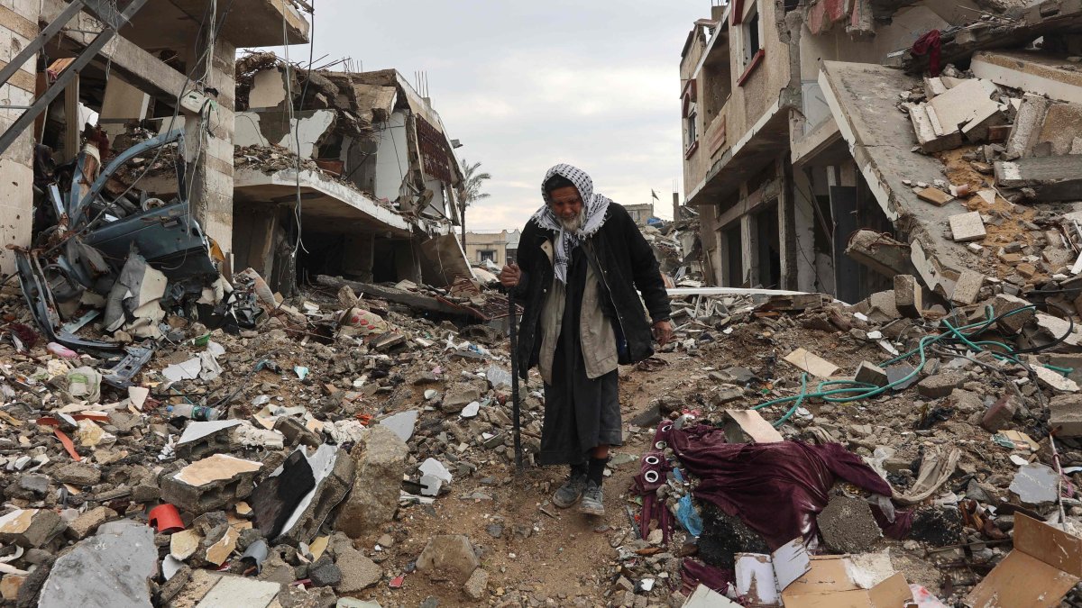 A Palestinian man walks past the debris of buildings in Gaza City&#039;s southern al Zeitoun neighborhood, Gaza, Palestine, Feb. 10, 2025. (AFP Photo)