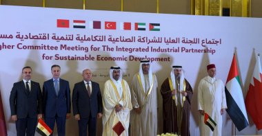 Industry and Technology Mehmet Fatih Kacır (L) poses for a photo with other officials during a meeting of the Industrial Partnership for Sustainable Economic Development, Doha, Qatar, Feb. 9, 2025. (AA Photo)