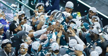 Philadelphia Eagles team members hold the Vince Lombardi Trophy as they celebrate defeating the Kansas City Chiefs at the Super Bowl, New Orleans, Louisiana, U.S., Feb. 9, 2025. (EPA Photo)