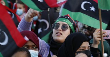 Libyans celebrate the February Revolution Day in Martyrs&#039; Square, Tripoli, Libya, Feb. 18, 2022. (AP Photo)