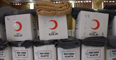 Boxes of winter aid, including food packages and blankets, are prepared for distribution, Damascus, Syria, Feb. 10, 2025. (AA Photo)